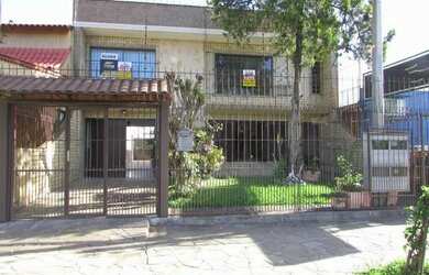 Imagem: A casa possui 4 Banheiros, 5 Vagas na garagem e 189m² de Área