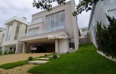 Imagem: A casa possui 4 Dormitórios, 5 Banheiros, 5 Vagas na garagem