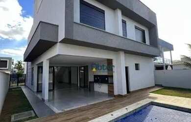 Imagem: A casa possui 4 Dormitórios, 5 Banheiros, 4 Vagas na garagem