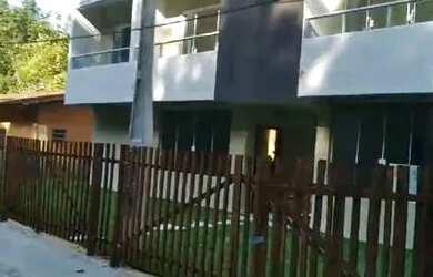 Imagem: A casa possui 2 Dormitórios, 3 Banheiros, 2 Vagas na garagem