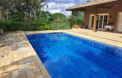 Imagem: A casa em condomínio possui 4 Dormitórios, 4 Banheiros, 4