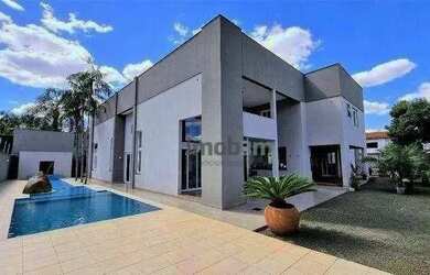 Imagem: A casa possui 5 Dormitórios, 5 Banheiros, 5 Vagas na garagem