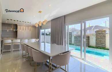 Imagem: A casa em condomínio possui 4 Dormitórios, 5 Banheiros, 316m²