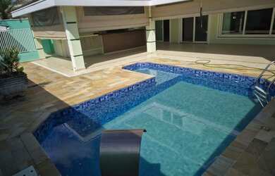 Imagem: A casa em condomínio possui 3 Dormitórios, 4 Banheiros, 5