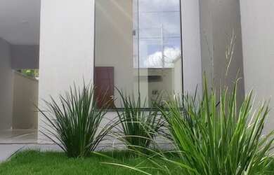 Imagem: A casa possui 3 Dormitórios, 2 Banheiros, 3 Vagas na garagem