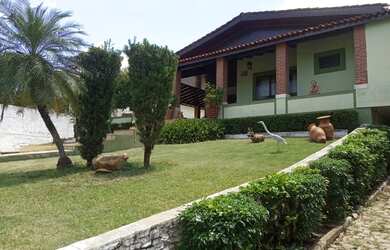 Imagem: A casa possui 5 Dormitórios, 5 Banheiros, 5 Vagas na garagem