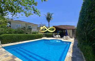 Imagem: A casa em condomínio possui 4 Dormitórios, 4 Banheiros, 2