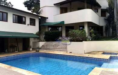 Imagem: A casa em condomínio possui 5 Dormitórios, 5 Banheiros, 4