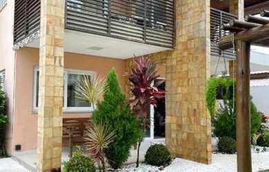 Imagem: A casa em condomínio possui 5 Dormitórios, 5 Banheiros, 5