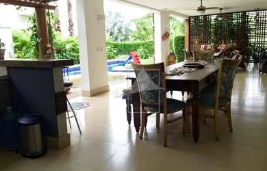 Imagem: A casa em condomínio possui 5 Dormitórios, 5 Banheiros, 5