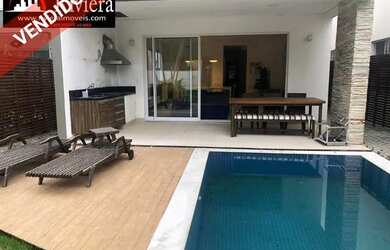 Imagem: A casa em condomínio possui 5 Dormitórios, 5 Banheiros, 2