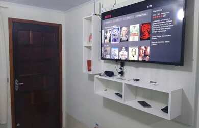 Imagem: A casa possui 4 Dormitórios, 2 Vagas na garagem e está localizado