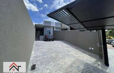 Imagem: A casa possui 3 Dormitórios, 4 Banheiros, 4 Vagas na garagem