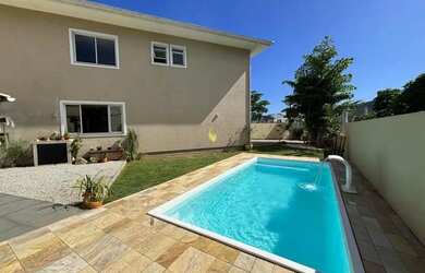 Imagem: A casa possui 3 Dormitórios, 4 Banheiros, 3 Vagas na garagem