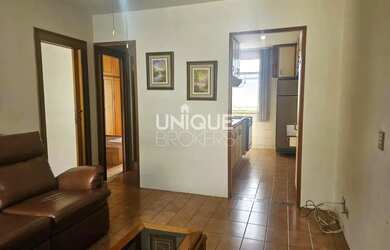 Imagem: O apartamento possui 2 Dormitórios, 1 Banheiro, 1 Vaga na garagem