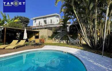 Imagem: A casa em condomínio possui 4 Dormitórios, 5 Banheiros, 4