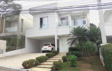 Imagem: A casa em condomínio possui 4 Dormitórios, 5 Banheiros, 5