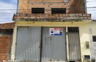 Imagem: A casa possui 2 Dormitórios, 1 Banheiro, 2 Vagas na garagem