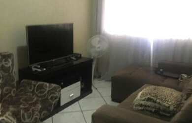 Imagem: A casa possui 4 Dormitórios, 1 Banheiro, 2 Vagas na garagem