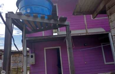 Imagem: A casa possui 2 Dormitórios, 1 Banheiro, 1 Vaga na garagem