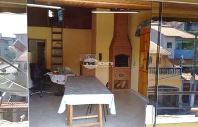 Imagem: A casa possui 4 Dormitórios, 5 Banheiros, 2 Vagas na garagem