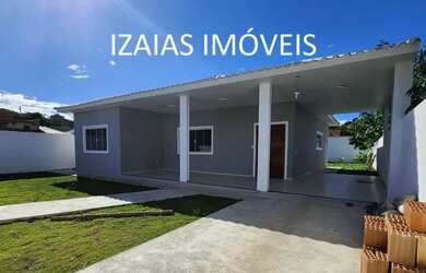 Imagem: A casa possui 3 Dormitórios, 2 Banheiros, 1 Vaga na garagem