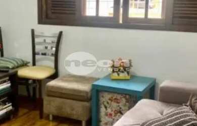 Imagem: A casa possui 3 Dormitórios, 3 Banheiros, 2 Vagas na garagem