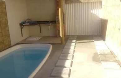 Imagem: A casa possui 3 Dormitórios, 3 Vagas na garagem e está localizado