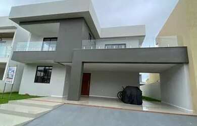 Imagem: A casa em condomínio possui 4 Dormitórios, 5 Banheiros, 2