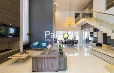 Imagem: A casa em condomínio possui 4 Dormitórios, 5 Banheiros, 4