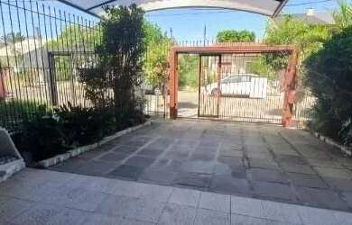 Imagem 15: Casa em Porto Alegre, no bairro Hípica, com 3 dormitório s , e 3 banheiros,...