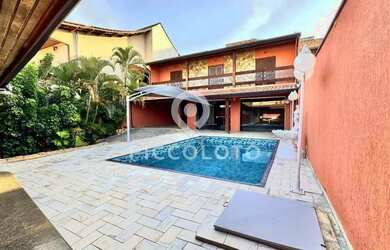 Imagem: A casa possui 5 Dormitórios, 5 Banheiros, 4 Vagas na garagem