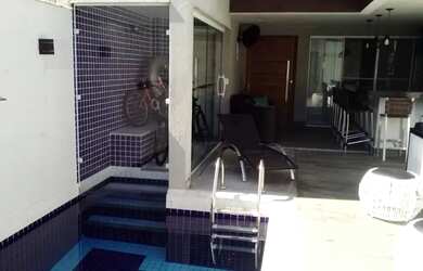 Imagem: A casa em condomínio possui 4 Dormitórios, 5 Banheiros, 2