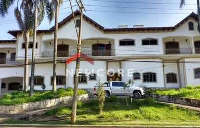 Imagem: A casa possui 5 Dormitórios, 5 Banheiros, 5 Vagas na garagem