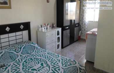 Imagem: A casa possui 3 Dormitórios, 2 Banheiros, 2 Vagas na garagem