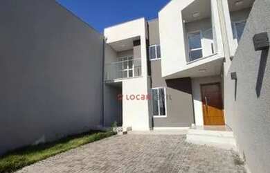 Imagem: A casa possui 3 Dormitórios, 3 Banheiros, 2 Vagas na garagem