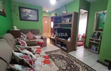 Imagem: A casa possui 4 Dormitórios, 2 Banheiros, 1 Vaga na garagem