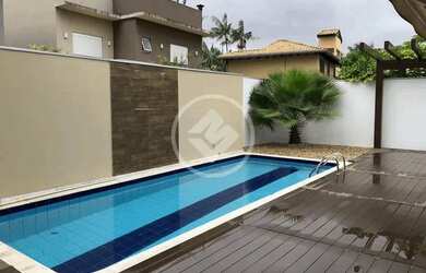 Imagem: A casa em condomínio possui 4 Dormitórios, 1 Banheiro, 2 Vagas