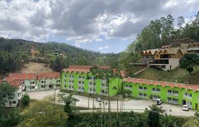 Imagem: A pousada chalé possui 2 Dormitórios, 2 Vagas na garagem e