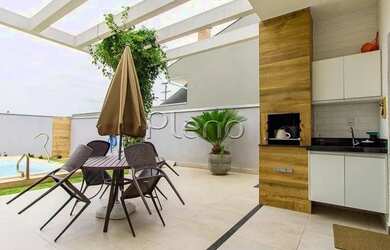 Imagem 10: Venda Casa com 200,00 metroQuadrado, 3 dormitório s , 4 vaga s . Swiss...