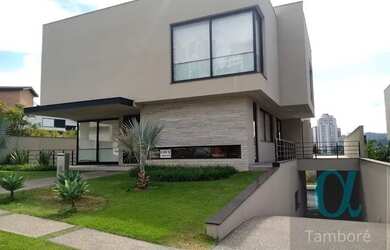 Imagem: A casa possui 5 Dormitórios, 5 Banheiros, 5 Vagas na garagem