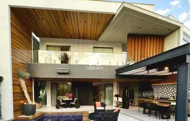 Imagem: A casa em condomínio possui 4 Dormitórios, 5 Banheiros, 2