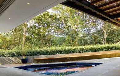 Imagem: A casa em condomínio possui 4 Dormitórios, 5 Banheiros, 4