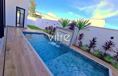 Imagem: A casa em condomínio possui 4 Dormitórios, 5 Banheiros, 4