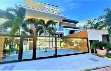 Imagem: A casa possui 5 Dormitórios, 5 Banheiros, 2 Vagas na garagem