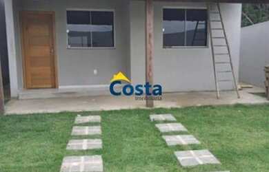 Imagem: A casa possui 2 Dormitórios, 1 Banheiro, 2 Vagas na garagem