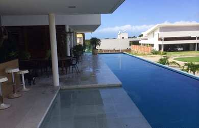 Imagem: A casa em condomínio possui 5 Dormitórios, 5 Banheiros, 760m²