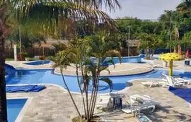 Imagem: A casa possui 3 Dormitórios, 1 Vaga na garagem e está localizado