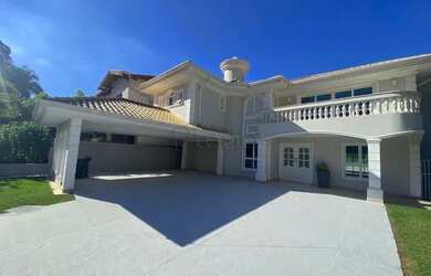 Imagem: A casa em condomínio possui 4 Dormitórios, 5 Banheiros, 4