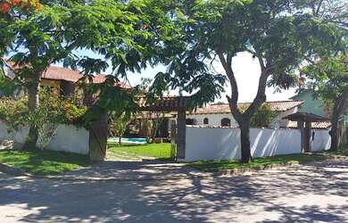 Imagem: A casa possui 5 Dormitórios, 5 Banheiros, 5 Vagas na garagem